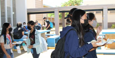Students leave the cafeteria with lunch, which is provided to all students at no cost this year.