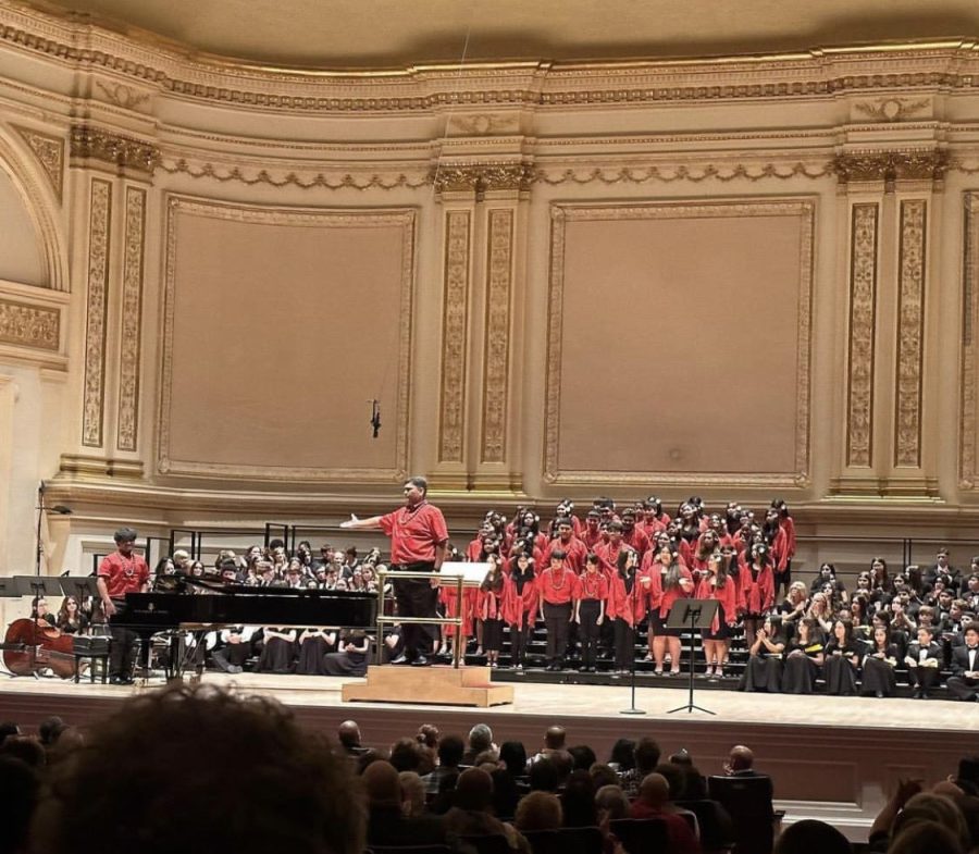 Waipahu choirs and Englar on stage at Carnegie Hall. Photo via @wis_chorus on Instagram.